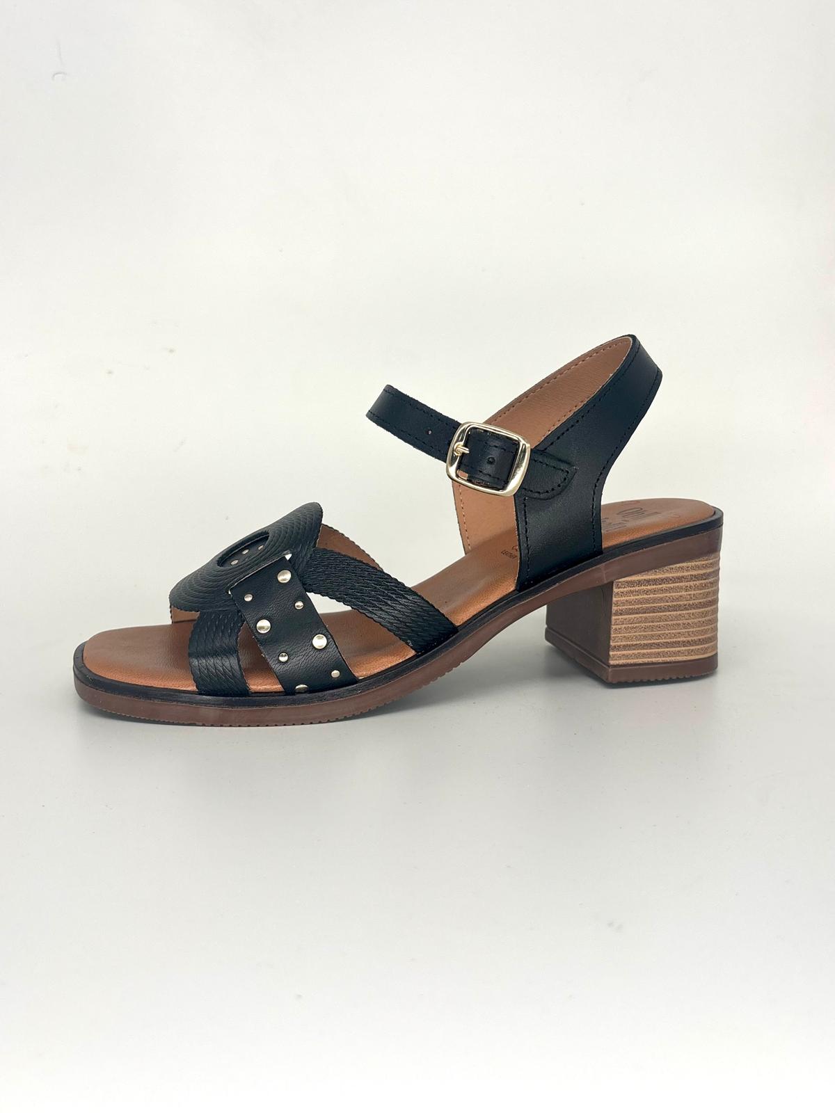 Esclava de tacón alto de piel en color negro